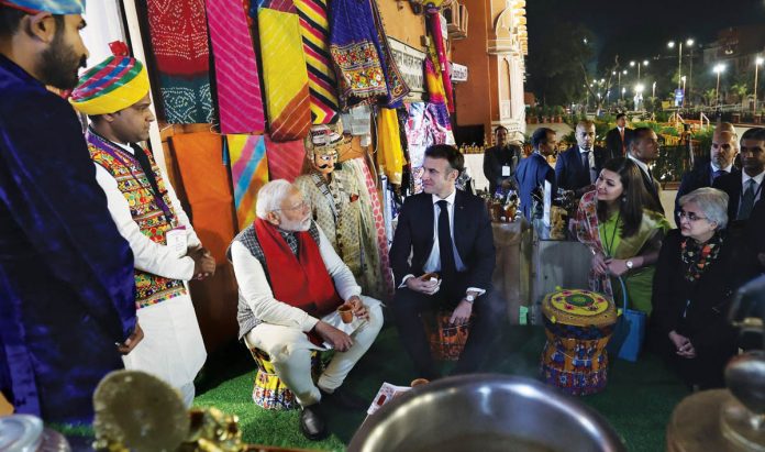 President Macron pays for tea with Modi